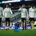 Jogadores do Columbus Crew andam para o vestiário
